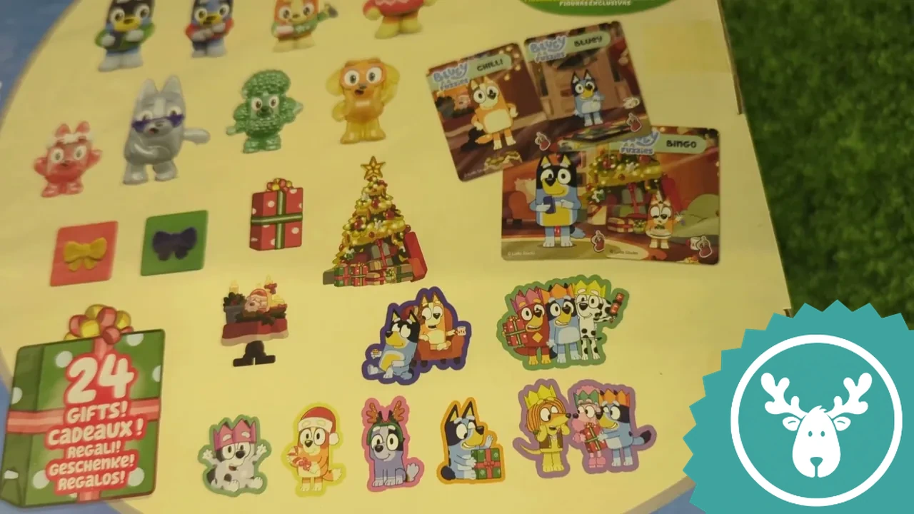 Im Detail sind hier die beidseitig bedruckten Tauschkarten sowie die bunten Sticker und Figuren abgebildet.